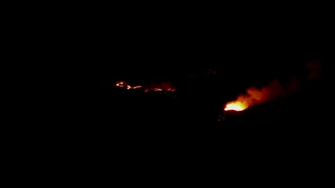 Drone view of lava flow of 2022 Piton de la fournaise eruption in Reunion island Stock Footage 241337272