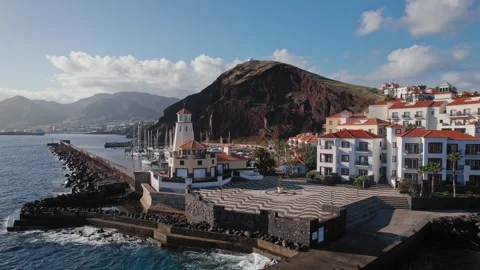 Drone view of the lighthouse on the coast of Madeira in the golden hour Stock Footage 300614116
