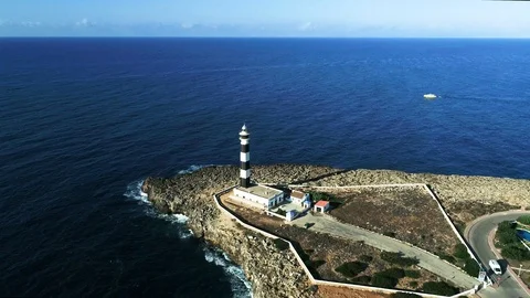 Drone view of a lighthouse on the island of Menorca Stock Footage 116388285