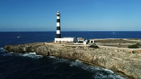 Drone view of a lighthouse on the island of Menorca Stock Footage 116388289
