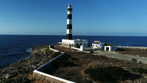 Drone view of a lighthouse on the island of Menorca Stock Footage 116388297