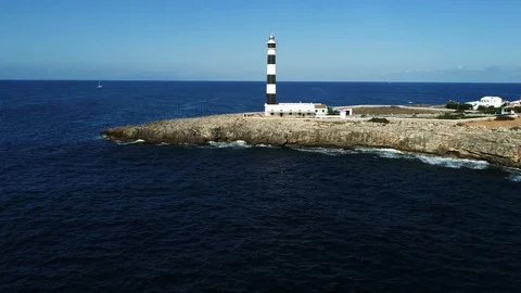 Drone view of a lighthouse on the island of Menorca Stock Footage 116388334