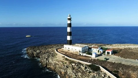 Drone view of a lighthouse on the island of Menorca Stock Footage 116388340