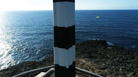 Drone view of a lighthouse on the island of Menorca Stock Footage 116388347