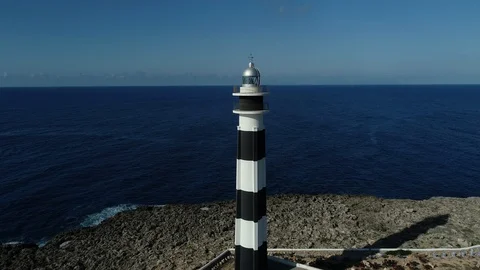 Drone view of a lighthouse on the island of Menorca Stock Footage 119536110