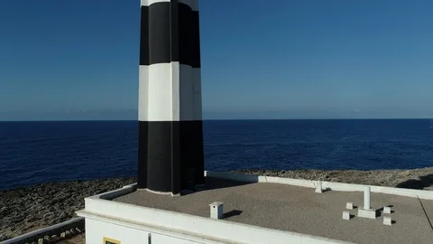 Drone view of a lighthouse on the island of Menorca Stock Footage 119536188