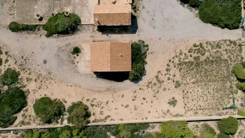 Drone View of Lighthouse Overlooking Crystal-Clear Waters Stock Footage 236568061