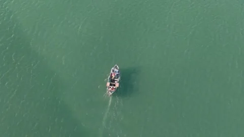 Drone view of lonely boat drifting on open ocean water Stock Footage 332129270