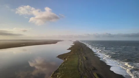 Drone View of a Long Spit with Sea and Lake 스톡 동영상 317300800