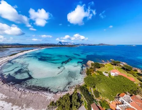 Drone view of Lu Impostu beach under a blue sky in springtime Stock Photos
