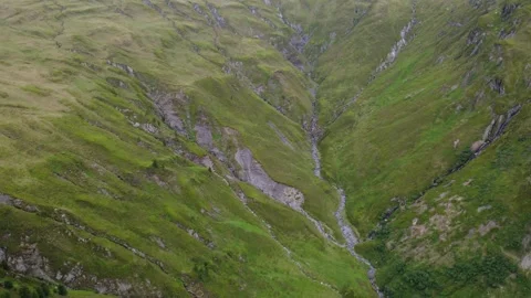 Drone View of a Lush Green Mountain Valley in the Austrian Alps During Summer Stock Footage 316395533