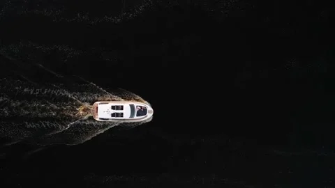 Drone view of luxury boat cruising in high speed in blue sea Video stock 200040636