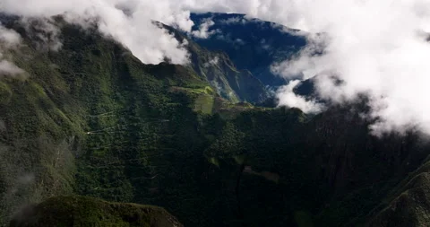 Drone view of Machu Picchu with eerie mountain fog over Andes mountains Stock Footage 326372721