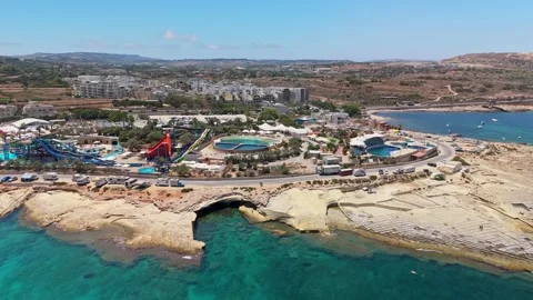Drone view of Malta aqua park by the coast with slides and wave pool in summer Stock Footage 341419734
