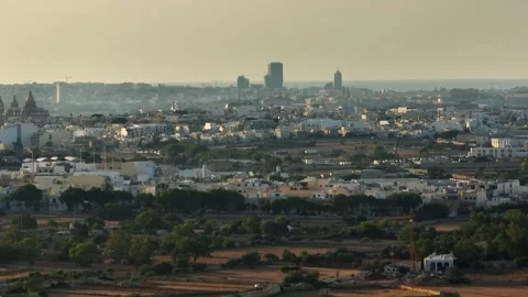 Drone view of Malta modern buildings, church. Sunset time Stock Footage 278886367