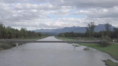 Drone View Of Man On Bicycle Riding On Bridge In Mountains Stock Footage 264269690