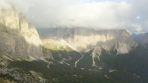 Drone view of man standing on mountain ridge in 4k. Stock Footage 143371534
