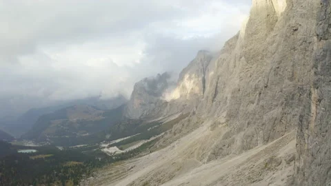 Drone view of man standing on mountain ridge in 4k. Stock Footage 143371548