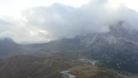 Drone view of man standing on mountain ridge in 4k. Stock Footage 143372664