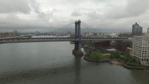 Drone view of Manhattan bridge under overcast sky Stock Footage 76916871