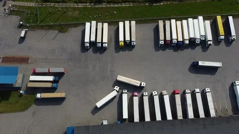 A drone view of many trucks in the unloading area of the terminal Stockbeeldmateriaal 194020373