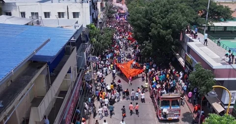 Drone view of Massive Crowd Dancing Joyfully During Ganesha Immersion Celeb.. Stock Footage 340083990