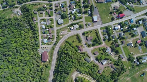 Drone View of Matapedia Road Bridge and Residential Area Along the River Stock Footage 341827633