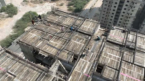 Drone view of metal framework on building during construction in Karachi Vídeos de archivo 308188562