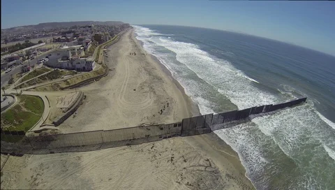 Drone view of Mexico - US Border Fence Wall in San Diego Stock Footage 101077964