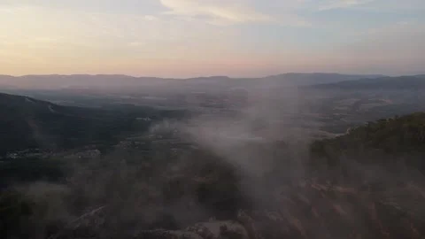 Drone view of misty mountain valley at sunrise in Spain Stock Footage 314605371
