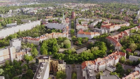 Drone view of a modern, environmentally friendly city. Green street roundabout. Stock Footage 146049438