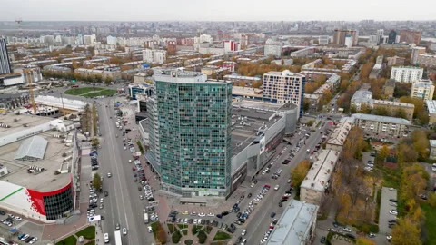 Drone view of a modern skyscraper located in the city of Novosibirsk in autumn Stock Footage 254855961