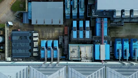 Drone view of modular data hall architecture and rooftop HVAC cooling units for Stock Footage 335013387