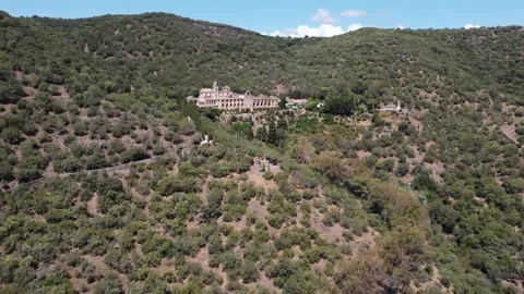Drone view of Monastery surrounded by mountains and Mediterranean vegetation. Stock Footage 171512640