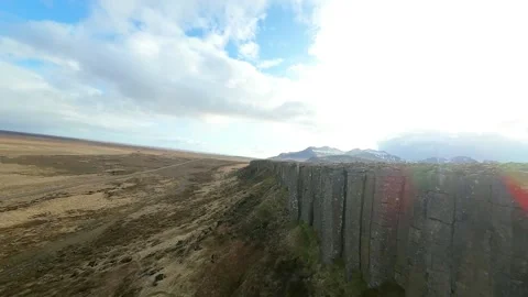 Drone view of moorland with stone wall and distant mountains Stock Footage 341609280