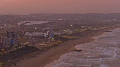 Drone view of Moses Mabhida Stadium at sunset 動画素材 340563994