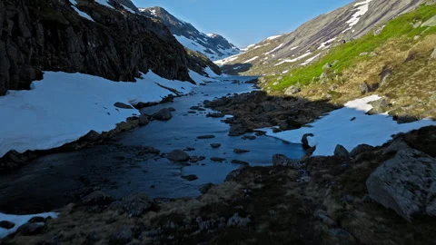 Drone view of mountain gorge and flowing river near Kjerag. Stock Footage 328129216