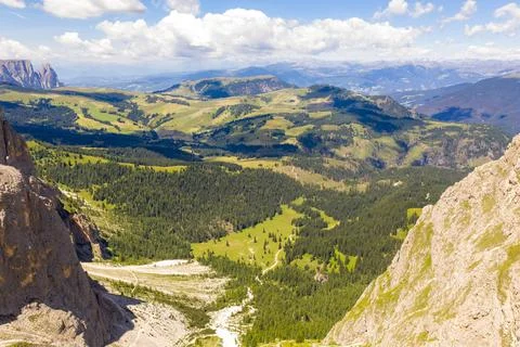 Drone view of mountain meadows and hiking path through it Stock Photos
