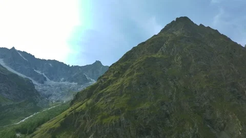 Drone View of Mountain Peak and Glacier in Summer near La Fouly Stock Footage 318920047