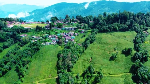 Drone View of Mountain Town with Green Tea Gardens and Valley Views Stock Footage 322561077