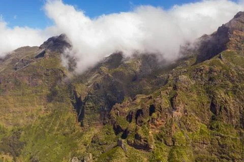 Drone view of mountains buried in clouds Stock Photos