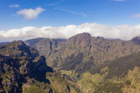 Drone view of mountains buried in clouds Stock-Fotos