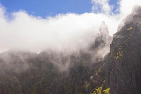 Drone view of mountains buried in clouds Stock Photos