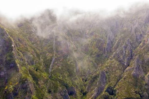 Drone view of mountains buried in clouds Foto stock