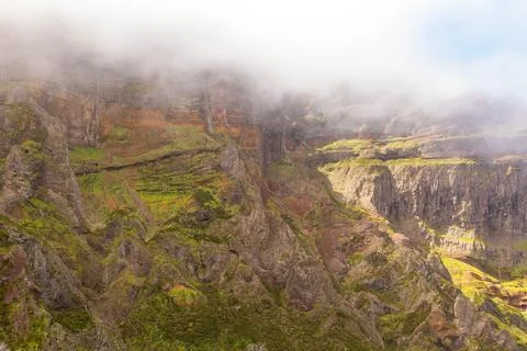 Drone view of mountains buried in clouds Stock Photos
