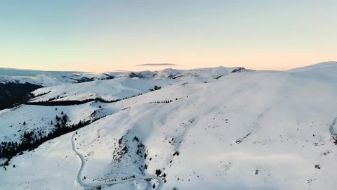 Drone view of mountains landscape at sunset in the winter season Stock Footage 296550530
