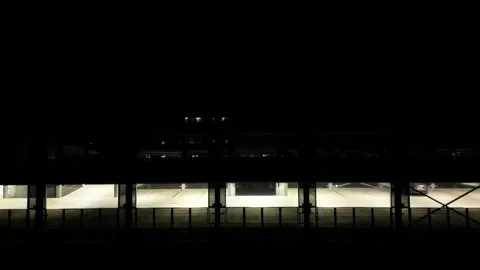 Drone view of a multi-level car park at night. Stock Footage 252554895
