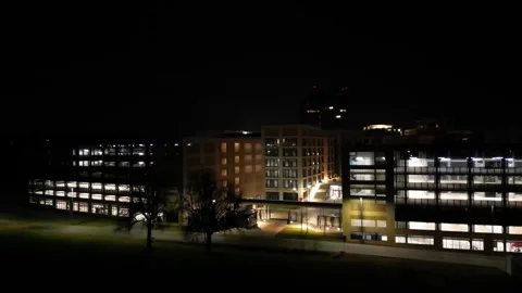 Drone view of a multi-level car park at night. Stock-Footage 252555031