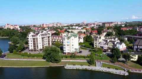 Drone view of multi-storey and private houses in the center of a European city 動画素材 180038698