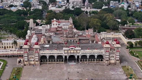 Drone view of Mysore Palace or Amba Vilas historic royal residence amidst t.. Video stock 330988934